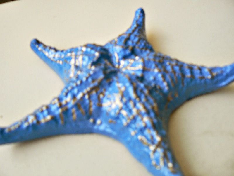 Blue sea star with gold