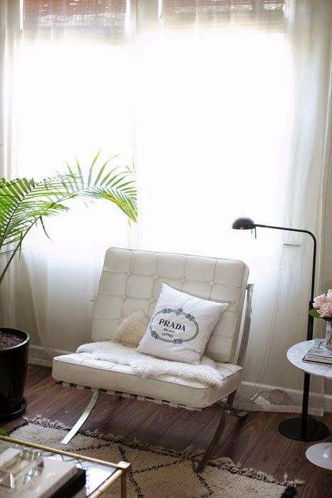 15 Erika Brechtel living room Barcelona chair Prada pillow black floor lamp Saarinen table