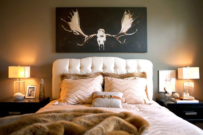 57 Erika Brechtel bedroom tufted headboard Kelly Wearstler duvet antlers artwork