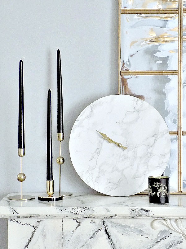 Faux marble clock on faux marble mantel