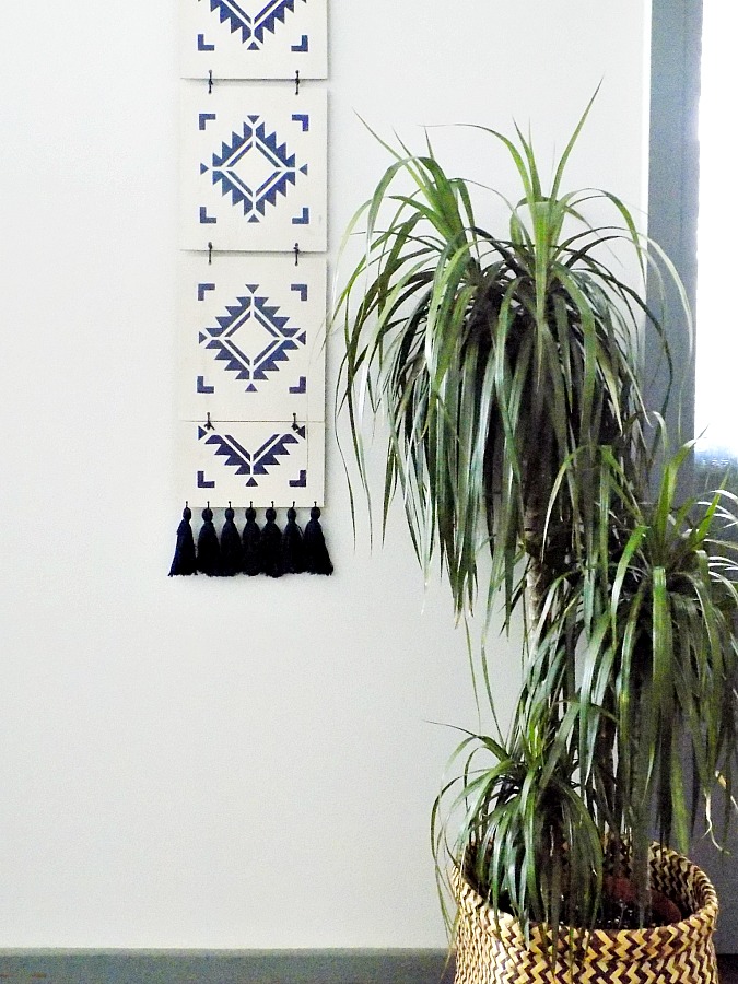 Boho wooden wall art with stencil and tassels