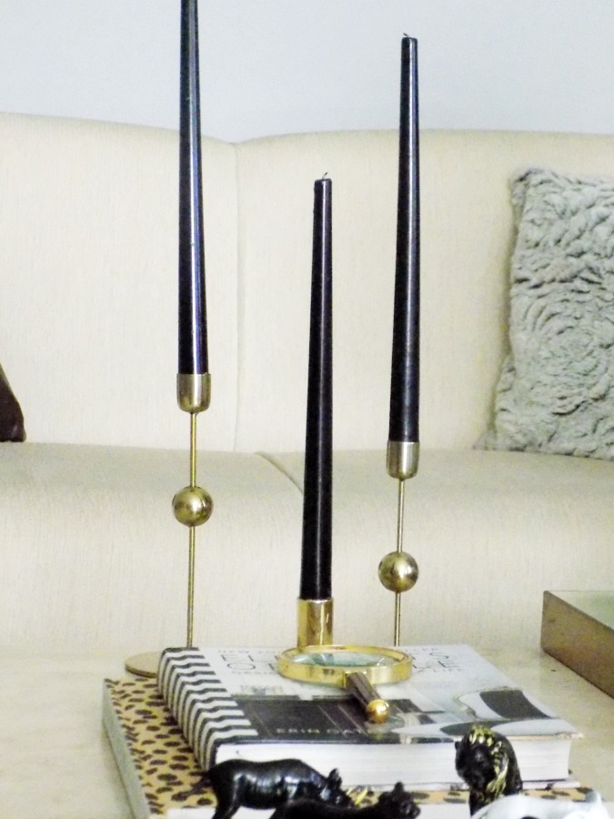 Brass candle holders, black candles